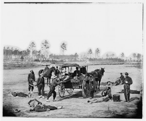 Unknown location. Zouave ambulance crew demonstrating removal of wounded soldiers from the field