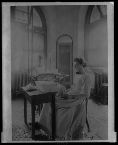 Women trimming and stacking currency sheets at the Bureau of Engraving & Printing (ca.1890; LOC - LC-USZ62-137136)