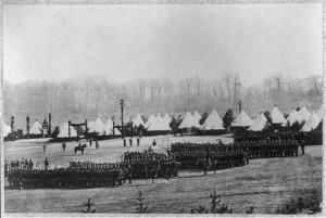 Civil War camp scene. Bird's-eye view of troops in formation and tents in backgrd (no date; LOC: LC-USZ62-82883)