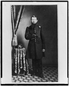 Unidentified Union officer, full-length portrait with right hand in coat, facing front (between 1860 and 1870; LOC: LC-USZ62-119415)