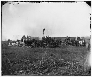 Brandy Station, Va. Wagons and men of the U.S. Military Telegraph Construction Corps (1864 February; LOC: LC-DIG-cwpb-03717)
