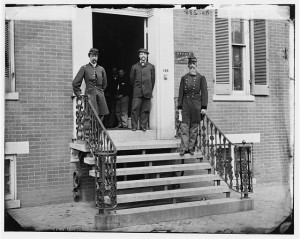 Washington, D.C. Gen. William Hoffman, Commissary General of Prisoners (at right) and staff on steps of office, F. St. at 20th NW (1865; LOC: LC-DIG-cwpb-03953)