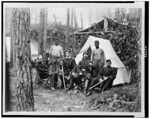 Officers of 114th Pennsylvania Infantry in front of Petersburg, Va., August, 1864 (Four union officers in front of tent, with two Afro-American Servants(?)1864; LOC: LC-USZ62-105798)