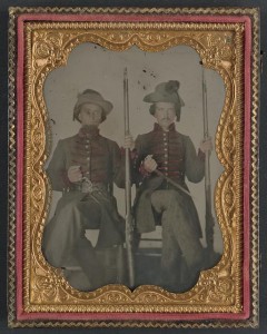 Two unidentified soldiers in Confederate uniforms with muskets and knives (between 1861 and 1865; LOC: LC-DIG-ppmsca-32480)