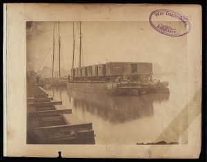 Transportation on the Potomac. Cars loaded at Alexandria can be carried on barges or arks to Aquia Creek, and sent to stations where the Army of the Potomac is supplied, without break of bulk (ca. 1862 or 1863 by Andrew J. Russell; LOC:  LC-DIG-ppmsca-10301)