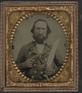 Unidentified soldier in Confederate uniform with large Bowie knife and revolver (between 1861 and 1865; LOC: LC-DIG-ppmsca-32061)