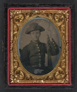 Unidentified soldier in Confederate shell jacket and tricorn hat with first model Maynard carbine (between 1861 and 1865; LOC: LC-DIG-ppmsca-37183)