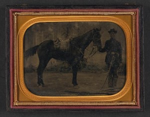 Unidentified soldier in Union uniform with cavalry saber standing next to horse fitted with McClellan saddle (between 1861 and 1865; LOC: LC-DIG-ppmsca-37119 )