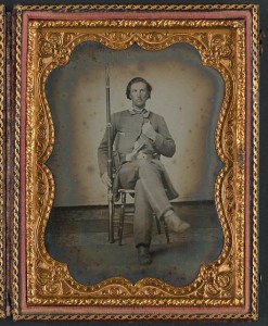 Unidentified soldier in Confederate uniform with musket and knife (between 1861 and 1865; LOC: LC-DIG-ppmsca-31292)