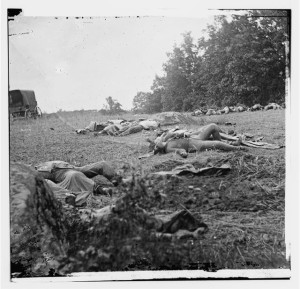 [Gettysburg, Pa. Confederate dead gathered for burial at the edge of the Rose woods, July 5, 1863] (by Alexander gardner, 1863 July [5]; LOC: LC-DIG-cwpb-00882)