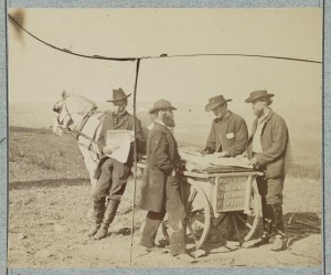 Newsboy in camp (by Alexander Gardner, Culpeper, Va., Nov. 1863; LOC: LC-DIG-ppmsca-33163)