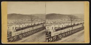Home views. No. 15, Rebel prison - 1865 (Elmira, N.Y. : Published by J.E. Larkin, 118 Water Street, [between 1865 and 1880]; LOC: LC-DIG-stereo-1s02989)