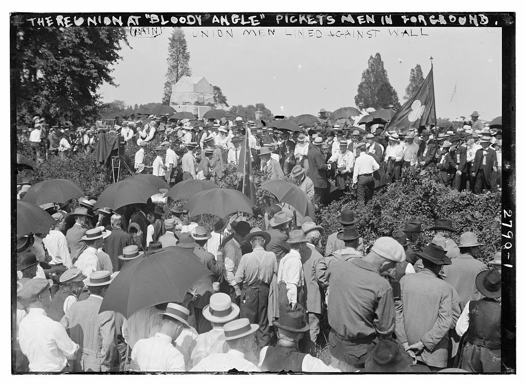 The reunion at "Bloody Angle" - Pickett's men in for[e]ground; Union men lined against wall  (1913; LOC: http://www.loc.gov/item/ggb2005013846/)
