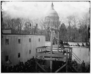 Washington, D.C. Soldier springing the trap; men in trees and Capitol dome beyond (by Alexander Gardner; LOC: http://www.loc.gov/item/cwp2003001033/PP/)