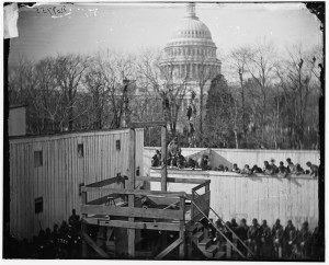 Washington, D.C. Hooded body of Captain Wirz hanging from the scaffold (by Alexander Gardner; LOC: http://www.loc.gov/item/cwp2003001034/PP/)