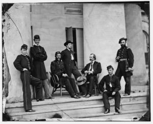 [Arlington, Va. Brig. Gen. Gustavus A. DeRussey (third from left) and staff on portico of Arlington House] (1864 May.; LOC: https://www.loc.gov/item/cwp2003000933/PP/#)