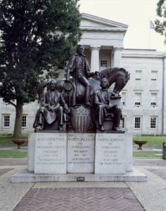 Charles Keck's statue honoring three North Carolina-born U.S. presidents: James K. Polk, Andrew Jackson, and Andrew Johnson, outside the state capitol in Raleigh, North Carolina (by Carol M. Highsmith (between 1980 and 2006); LOC: https://www.loc.gov/item/2011632478/)