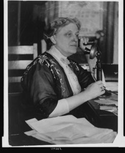 [Carrie Chapman Catt, half-length portrait, seated, facing left, on telephone] (between 1909 and 1932; LOC: https://www.loc.gov/item/94506343/)