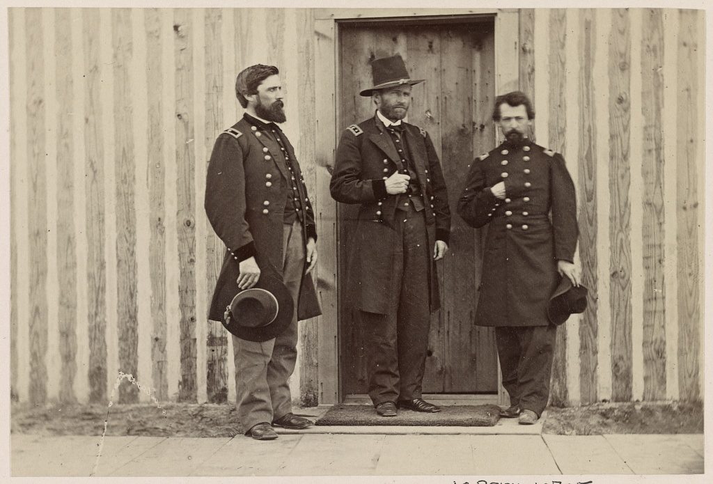Gen. John A. Rawlins, left, Gen. U.S. Grant, center, and an unidentified officer (photographed between 1861 and 1865, printed later; LOC: https://www.loc.gov/resource/ppmsca.34091/)