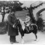 Quentin Roosevelt on pony beside White House policeman (1905; LOC: v)